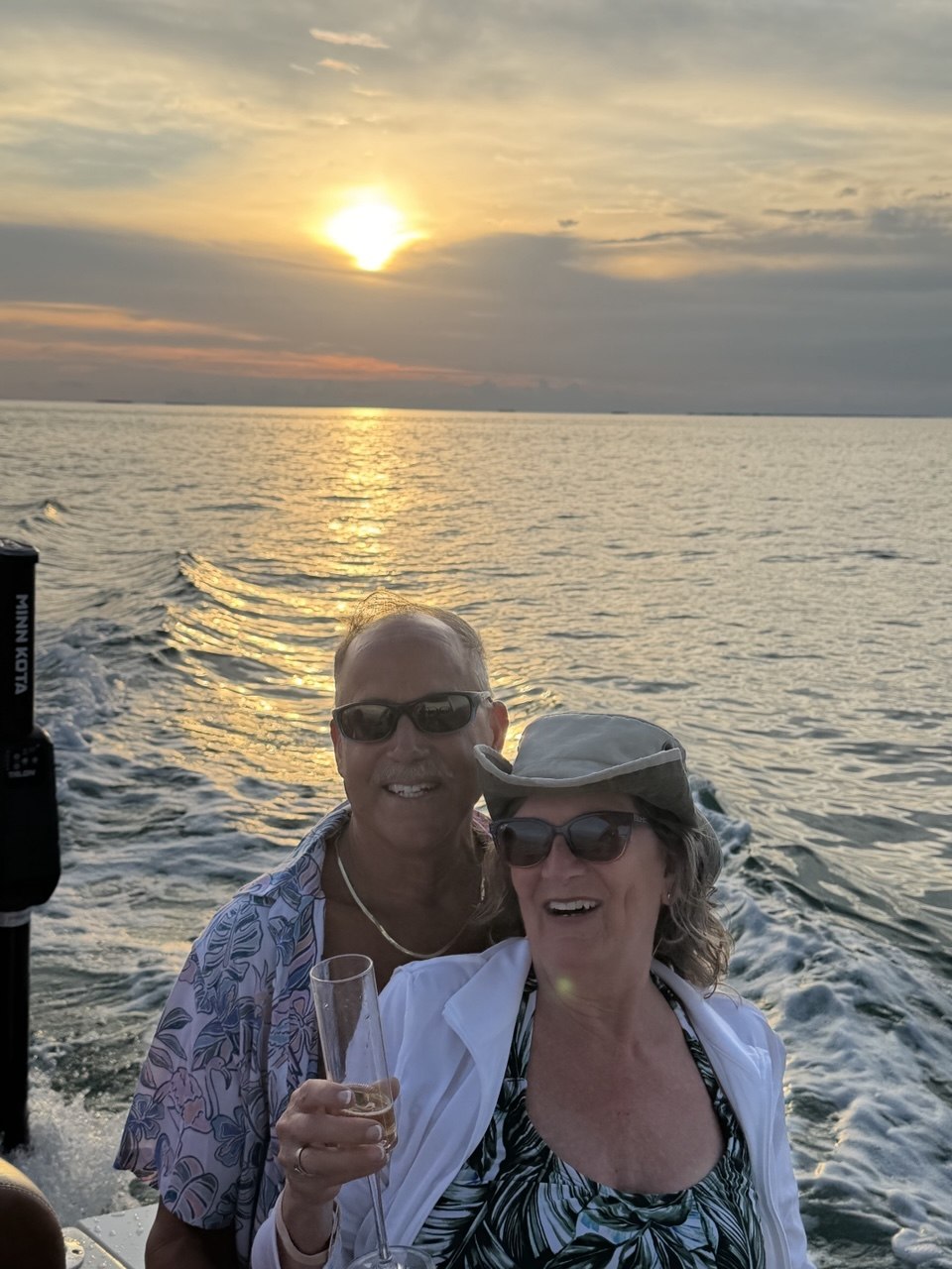 Couple enjoying champagne during a private sunset cruise in Islamorada